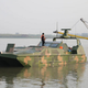 Illustration for article titled We Cant Tell if China’s Sea Lizard Drone-Boat-Tank Thing Is a Harbinger or Gimmick
